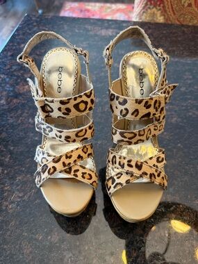 bebe Leopard-Print Strappy Wedge Heels in Tan and Black